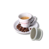 Tazzina da caffè espresso Bacca rossa con affianco una capsula di caffè compatibili Espresso Point®